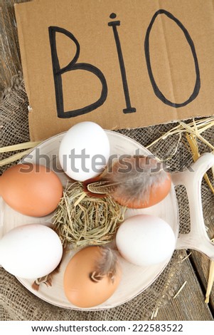 Eggs on wooden background. Organic products concept