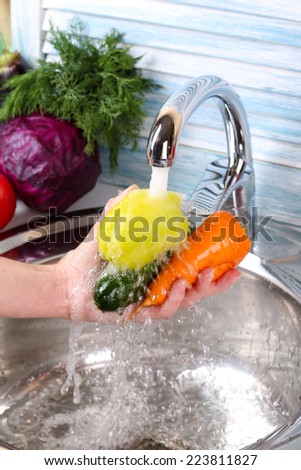 Washing vegetables, close-up