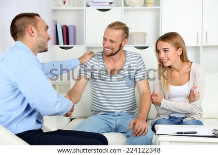 Young couple after therapy session with family psychologist