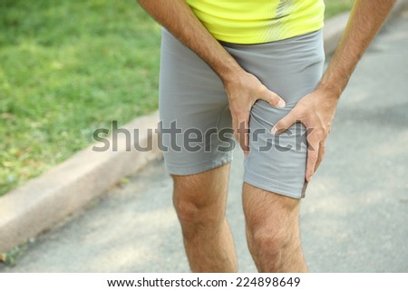 Sports injuries of man outdoors