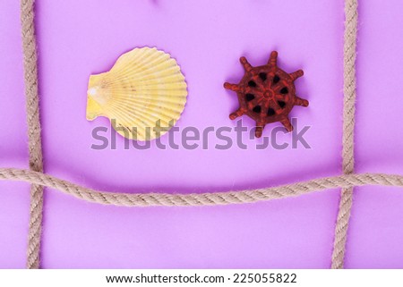 Sea souvenirs on purple background