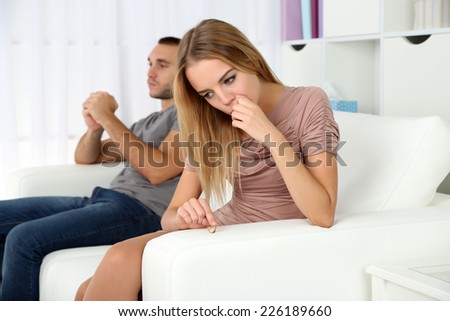 Young couple in quarrel at home