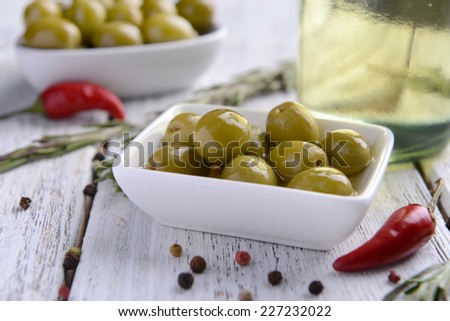 Marinated olives on table close-up