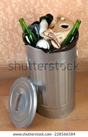 Recycling bin on wall background