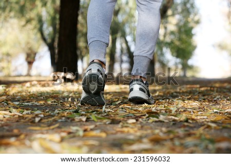 Young man jogging at park