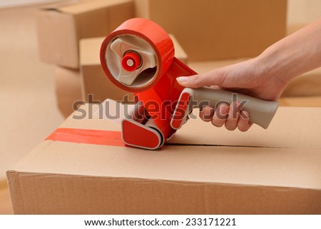 Packaging parcels with dispenser close-up