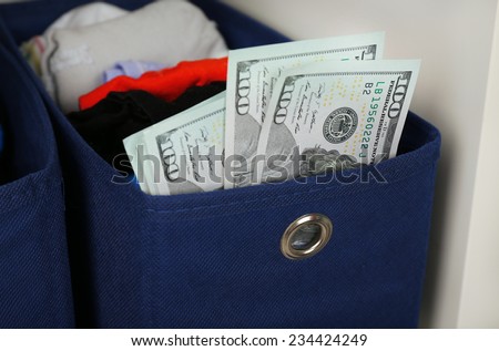 Hidden money in drawer close up