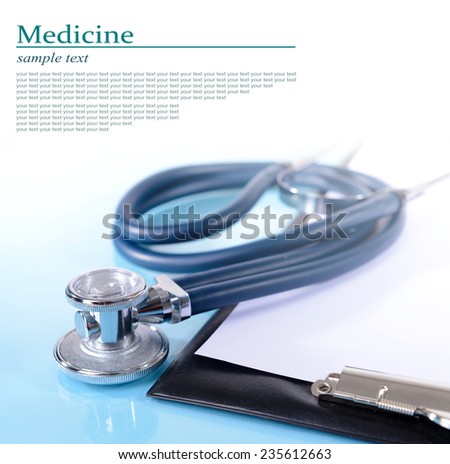 Stethoscope and other things on light background