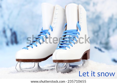 Let it snow greeting card with figure skates on it