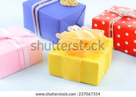 Colorful boxes on blue uneven background