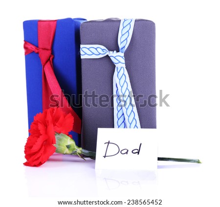 Two gift boxes with red carnation and card for Dad isolated on white background