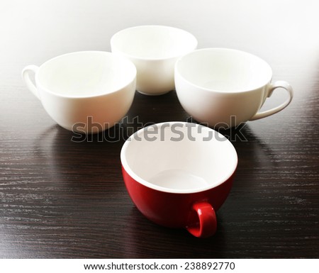 Individuality concept. Group of cups close up