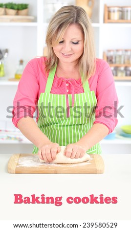 Woman cooking in kitchen, home baking concept
