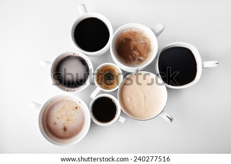 Lots of coffee cups on white background