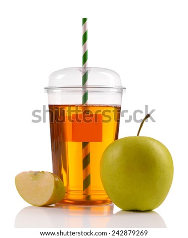 Juice in fast food closed cup with tube and apples isolated on white