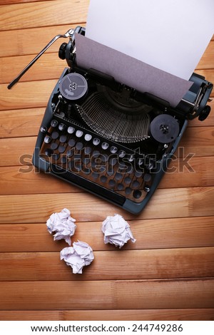 Antique Typewriter. Vintage Typewriter Machine on wooden table