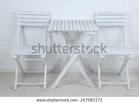 Wooden chairs and table in dining room