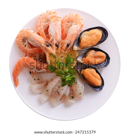 Tasty seafood on plate isolated on white