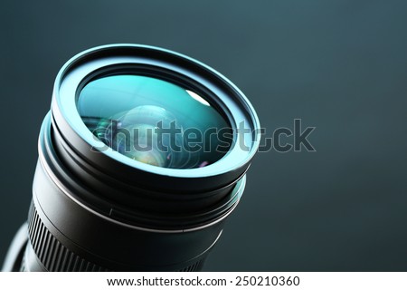 Camera lens on dark background