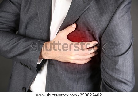Man having chest pain - heart attack close up