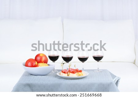 Table at home with food and drinks for friends