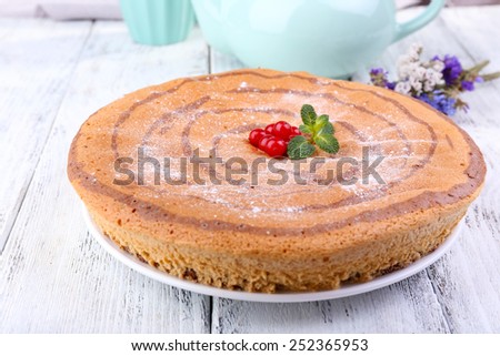 Tasty homemade pie on table