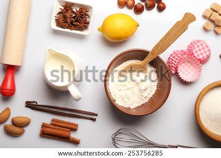 Food ingredients and kitchen utensils for cooking on white background