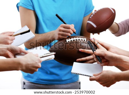 Autographs by American football star isolated on white background