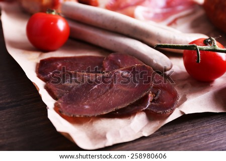 Assortment of deli meats on parchment, closeup