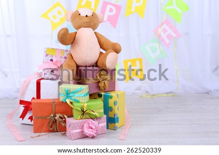 Many birthday gifts in room