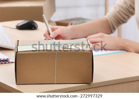 Cardboard box on work place in post office