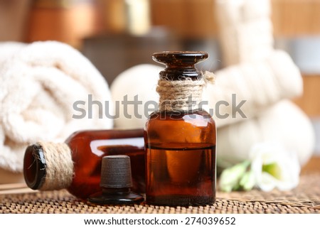 Beautiful spa composition with aroma oil on table close up