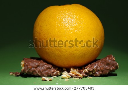 Concept of healthy and unhealthy food on color background