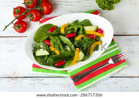 fresh vegetable salad in bowl on table close up