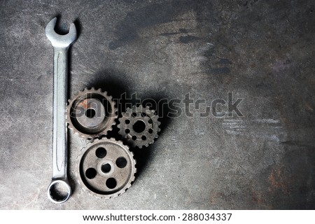 Group of rusty transmission gears on table close up