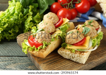 Meatball Sandwiches on wooden table background
