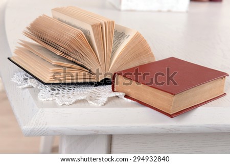 Heap of old books on table close up