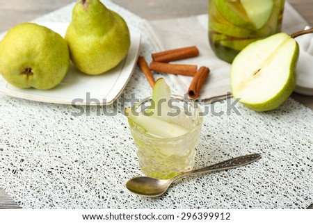 Pear juice with fresh fruits on table close up