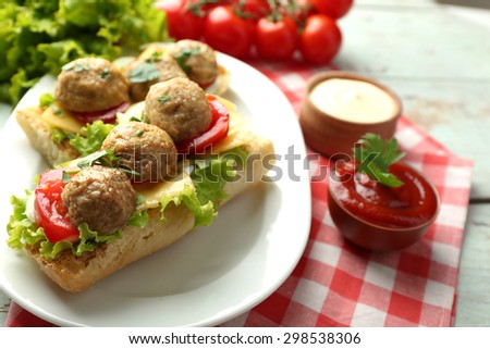 Meatball Sandwiches on wooden table background