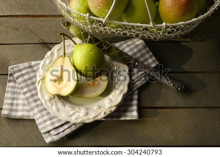 Ripe tasty pears on table close up