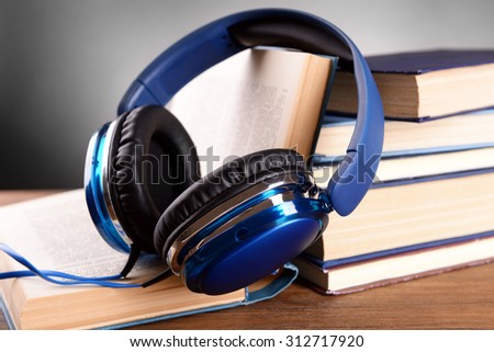 Books and headphones as audio books concept