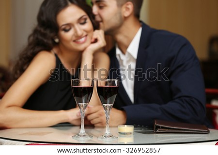young couple flirting at the restaurant