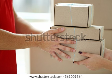 Delivery concept. Receiving package. Close up