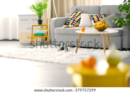 Living room interior with sofa and table