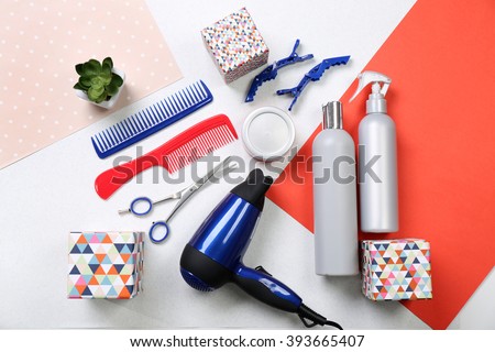 Barber set with tools, equipment, cosmetics and gift boxes on paper background