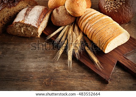 Fresh bread on wooden table