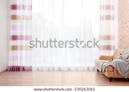 New sofa on curtain background