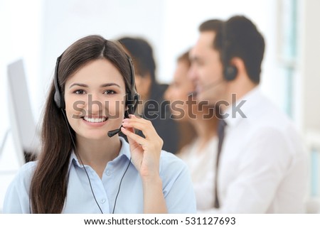 Female call center operator working in office