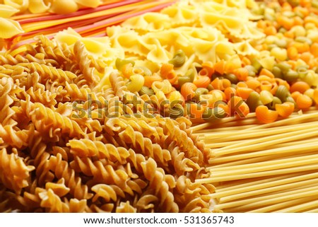 Raw pasta background, closeup