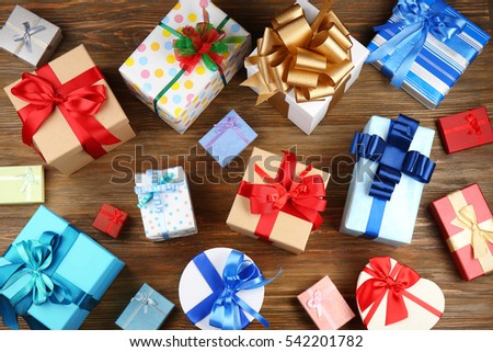 Set of gift boxes on wooden background
